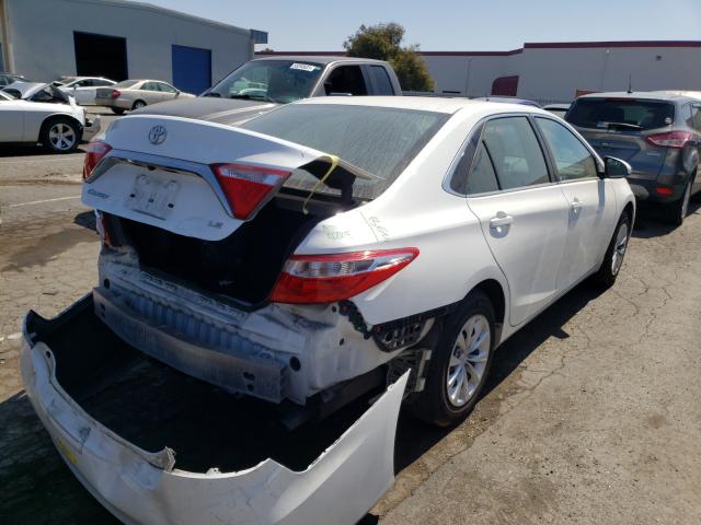 Photo 3 VIN: 4T4BF1FK2GR565215 - TOYOTA CAMRY LE 