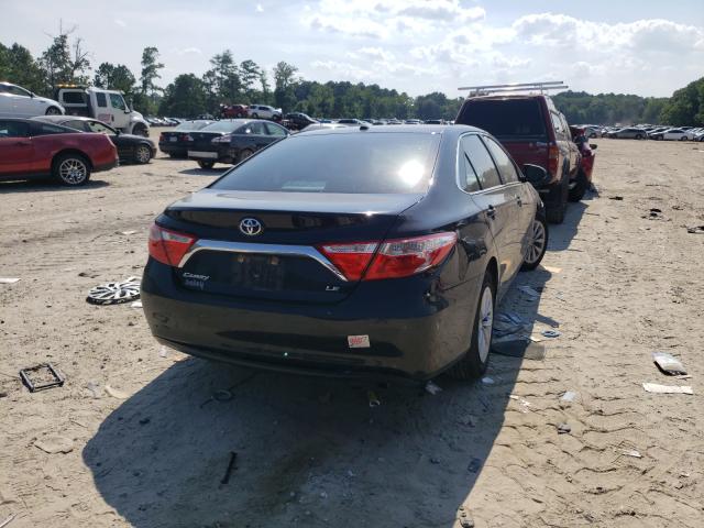 Photo 3 VIN: 4T4BF1FK4GR523905 - TOYOTA CAMRY LE 