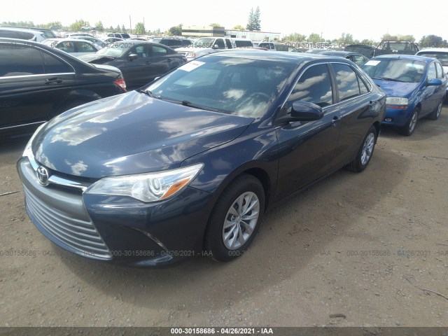 Photo 1 VIN: 4T4BF1FK9GR570749 - TOYOTA CAMRY 