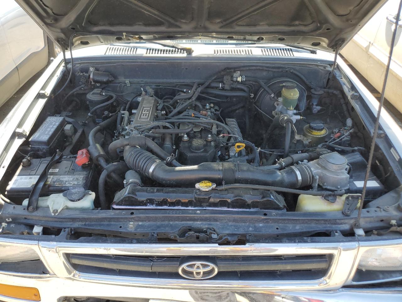 Photo 10 VIN: 4TARN01P9PZ059246 - TOYOTA PICKUP 