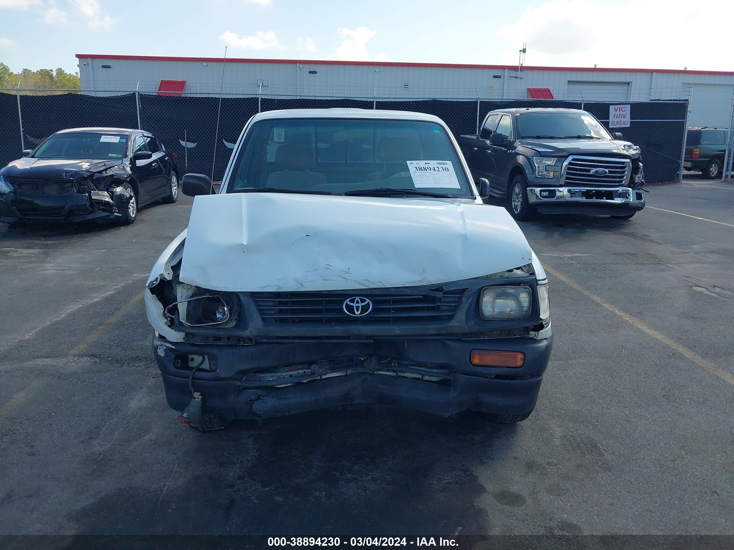 Photo 11 VIN: 4TAUN41B3SZ004421 - TOYOTA TACOMA 