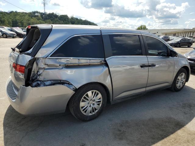 Photo 2 VIN: 5FNRL5H23GB052221 - HONDA ODYSSEY LX 