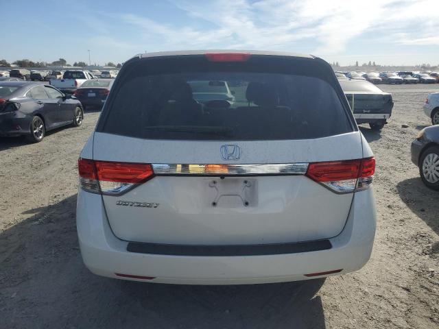 Photo 5 VIN: 5FNRL5H24GB106352 - HONDA ODYSSEY LX 