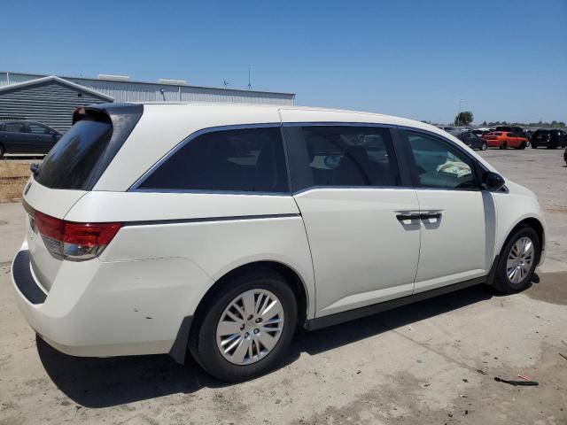 Photo 2 VIN: 5FNRL5H2XGB063457 - HONDA ODYSSEY LX 