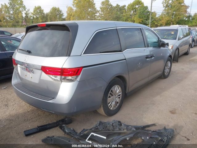 Photo 3 VIN: 5FNRL5H2XGB102015 - HONDA ODYSSEY 