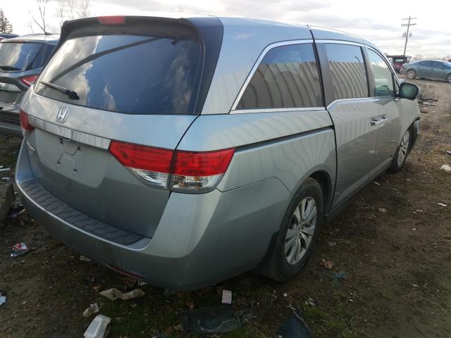 Photo 3 VIN: 5FNRL5H4XGB071463 - HONDA ODYSSEY EX 