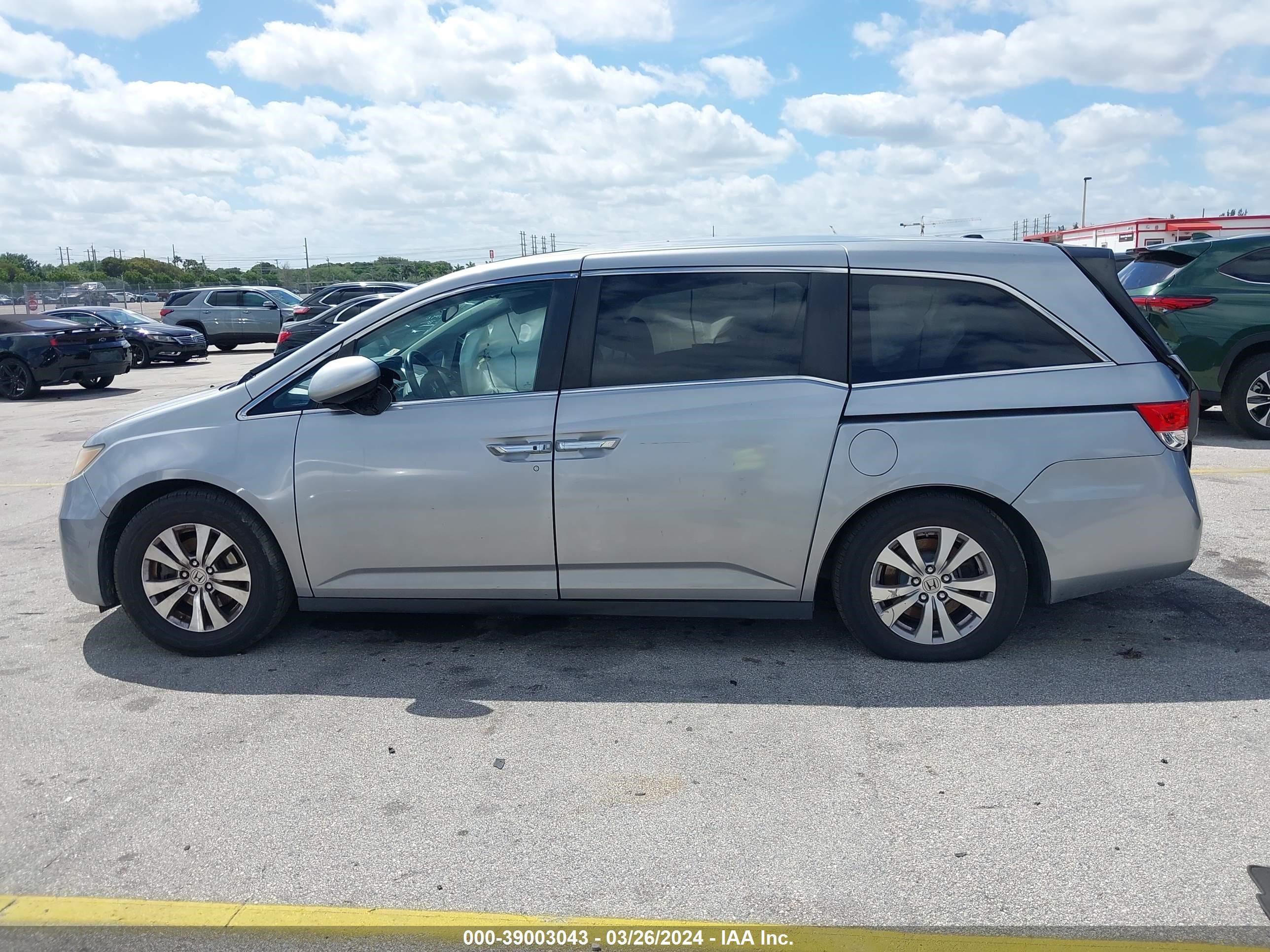 Photo 12 VIN: 5FNRL5H6XGB010115 - HONDA ODYSSEY 