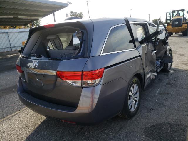 Photo 3 VIN: 5FNRL5H6XGB034849 - HONDA ODYSSEY EX 