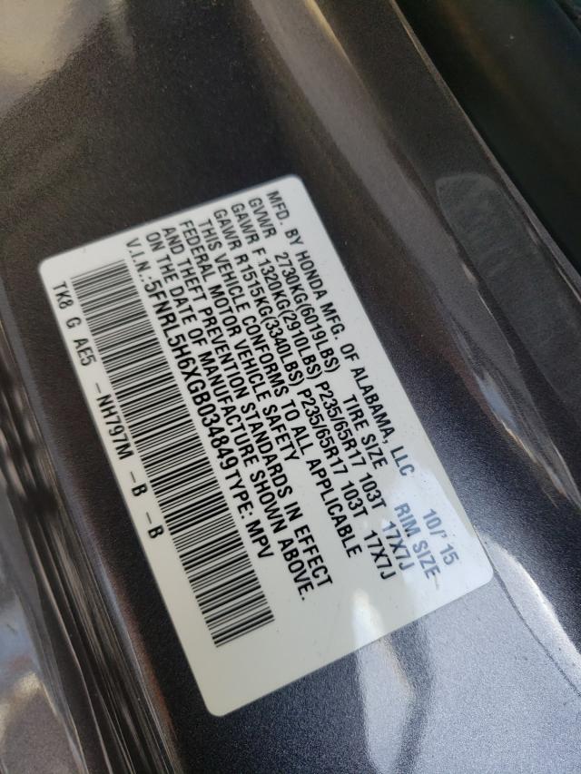 Photo 9 VIN: 5FNRL5H6XGB034849 - HONDA ODYSSEY EX 