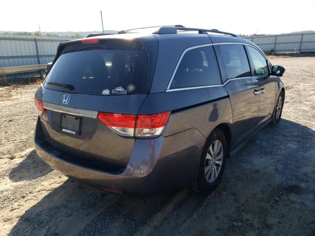 Photo 3 VIN: 5FNRL5H6XGB050887 - HONDA ODYSSEY EX 