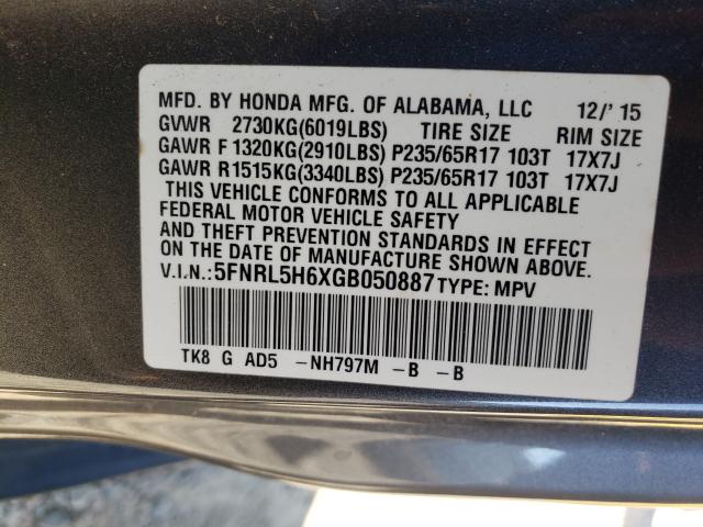 Photo 9 VIN: 5FNRL5H6XGB050887 - HONDA ODYSSEY EX 