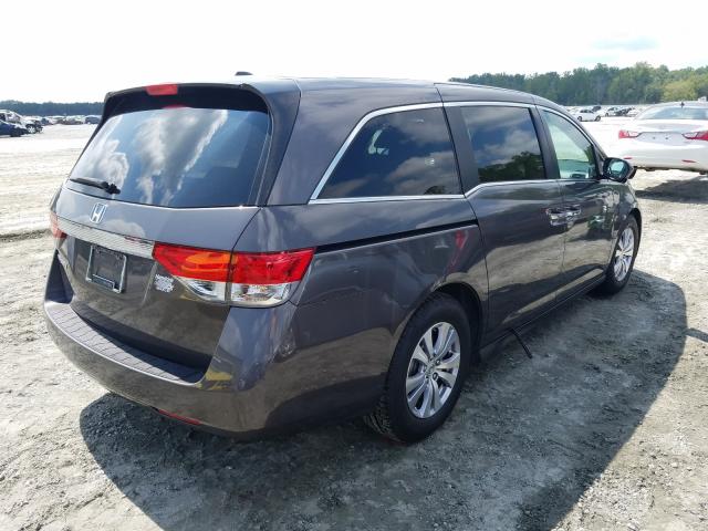 Photo 3 VIN: 5FNRL5H6XGB054339 - HONDA ODYSSEY 