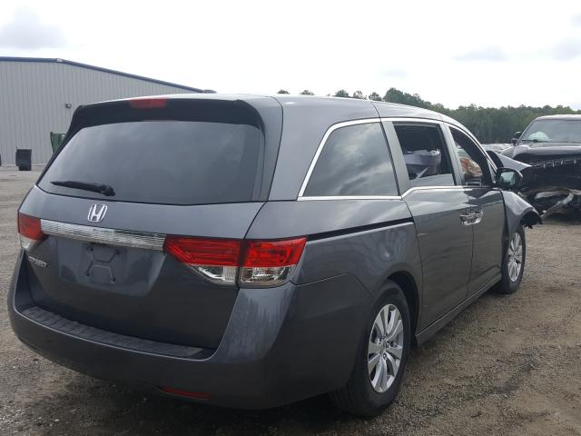 Photo 3 VIN: 5FNRL5H6XGB056673 - HONDA ODYSSEY EX 