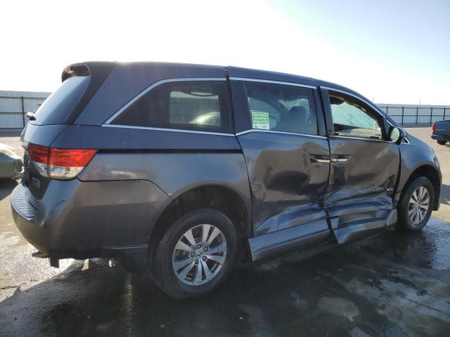 Photo 2 VIN: 5FNRL5H6XGB118511 - HONDA ODYSSEY EX 