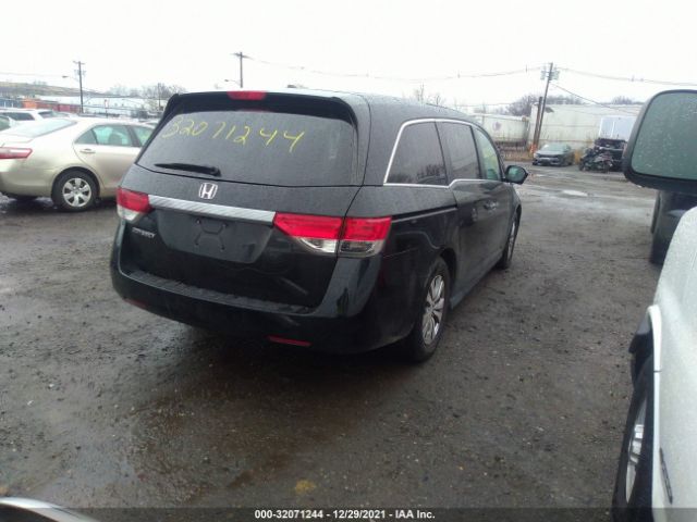 Photo 3 VIN: 5FNRL5H6XGB135275 - HONDA ODYSSEY 