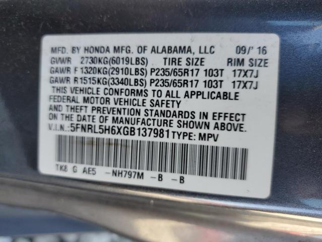 Photo 12 VIN: 5FNRL5H6XGB137981 - HONDA ODYSSEY EX 