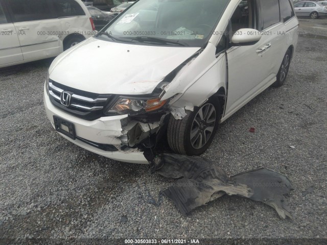 Photo 5 VIN: 5FNRL5H94EB070320 - HONDA ODYSSEY 