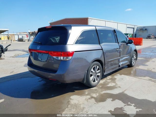 Photo 3 VIN: 5FNRL5H9XGB048731 - HONDA ODYSSEY 