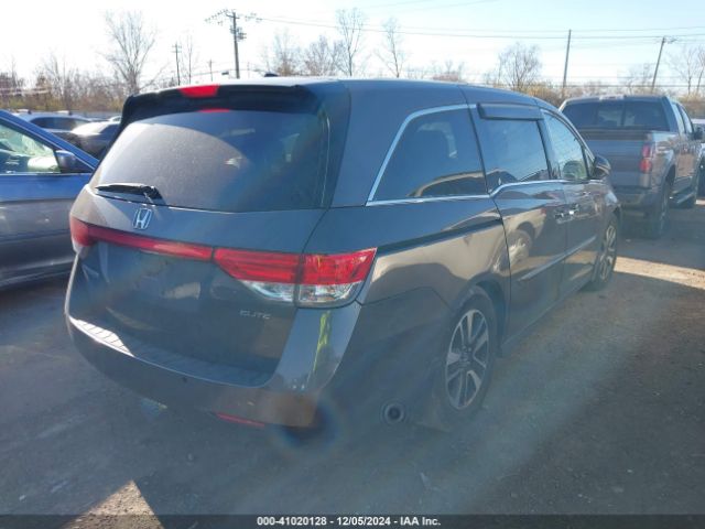 Photo 3 VIN: 5FNRL5H9XGB072477 - HONDA ODYSSEY 