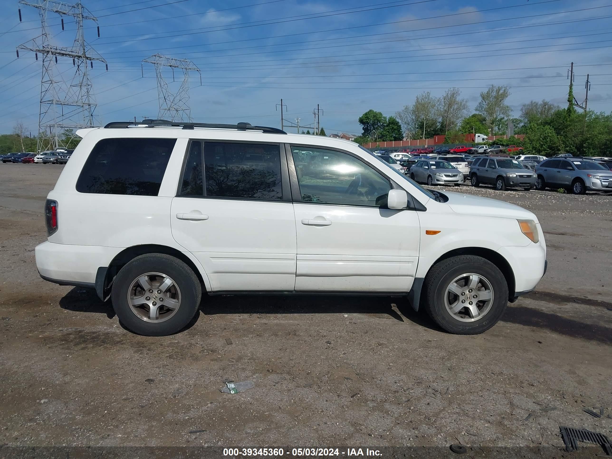 Photo 12 VIN: 5FNYF18527B009639 - HONDA PILOT 