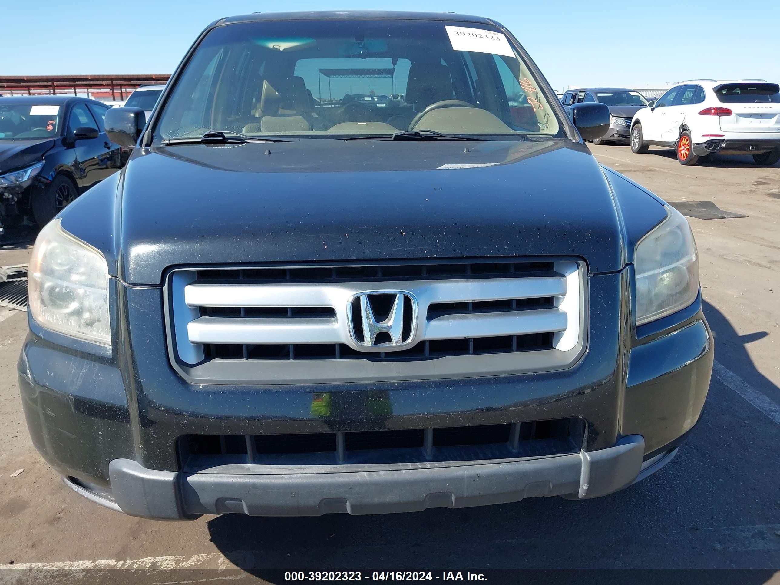 Photo 11 VIN: 5FNYF28727B007087 - HONDA PILOT 