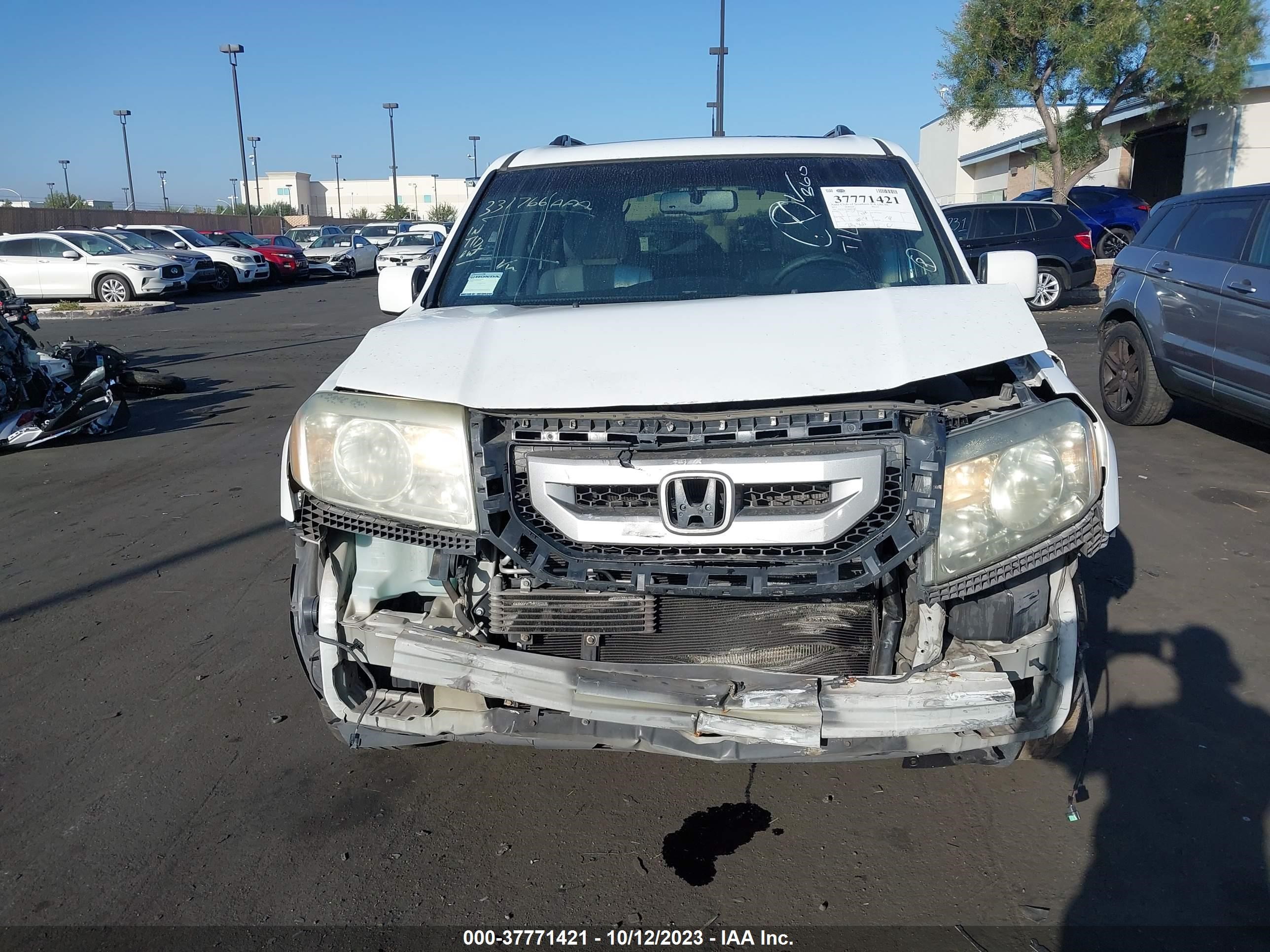 Photo 12 VIN: 5FNYF3H53BB025451 - HONDA PILOT 