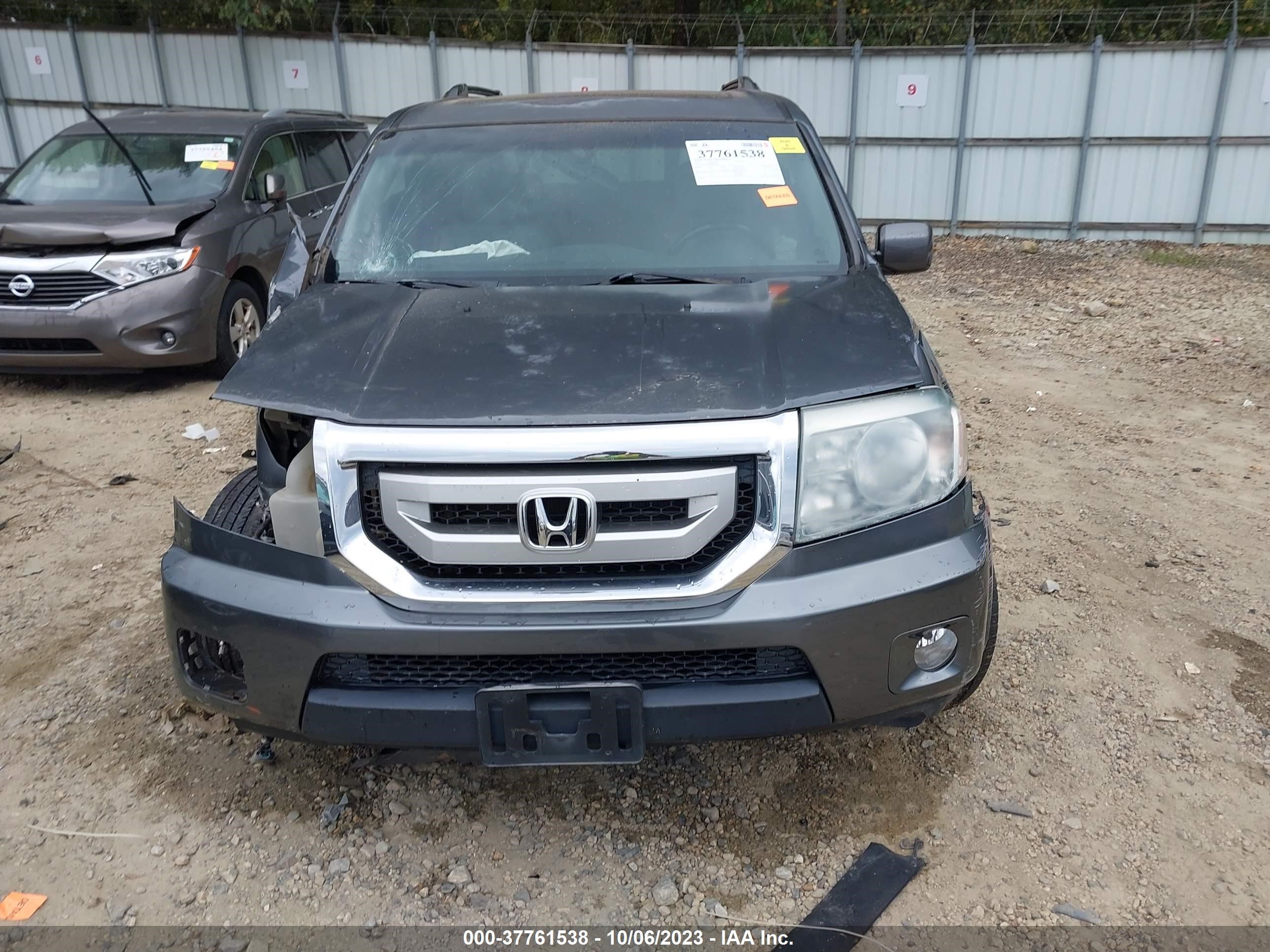 Photo 11 VIN: 5FNYF3H55AB018600 - HONDA PILOT 