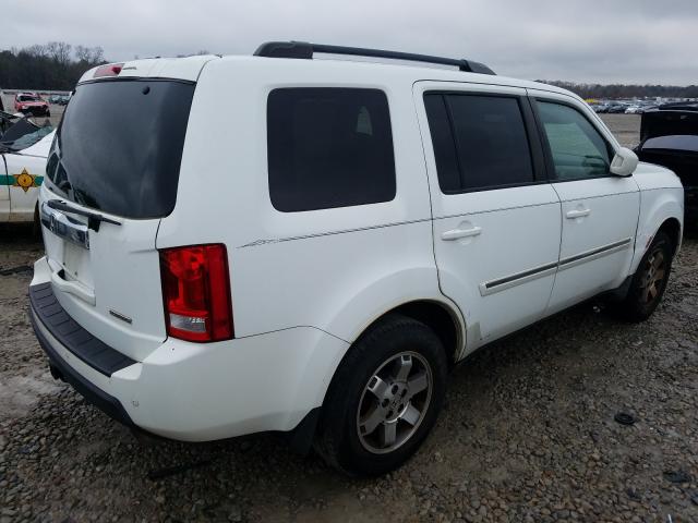 Photo 3 VIN: 5FNYF3H81AB003988 - HONDA PILOT TOUR 