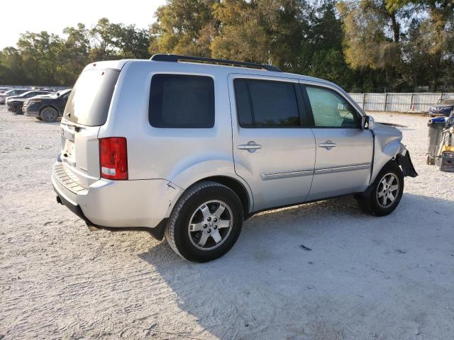 Photo 2 VIN: 5FNYF3H81AB005885 - HONDA PILOT TOUR 