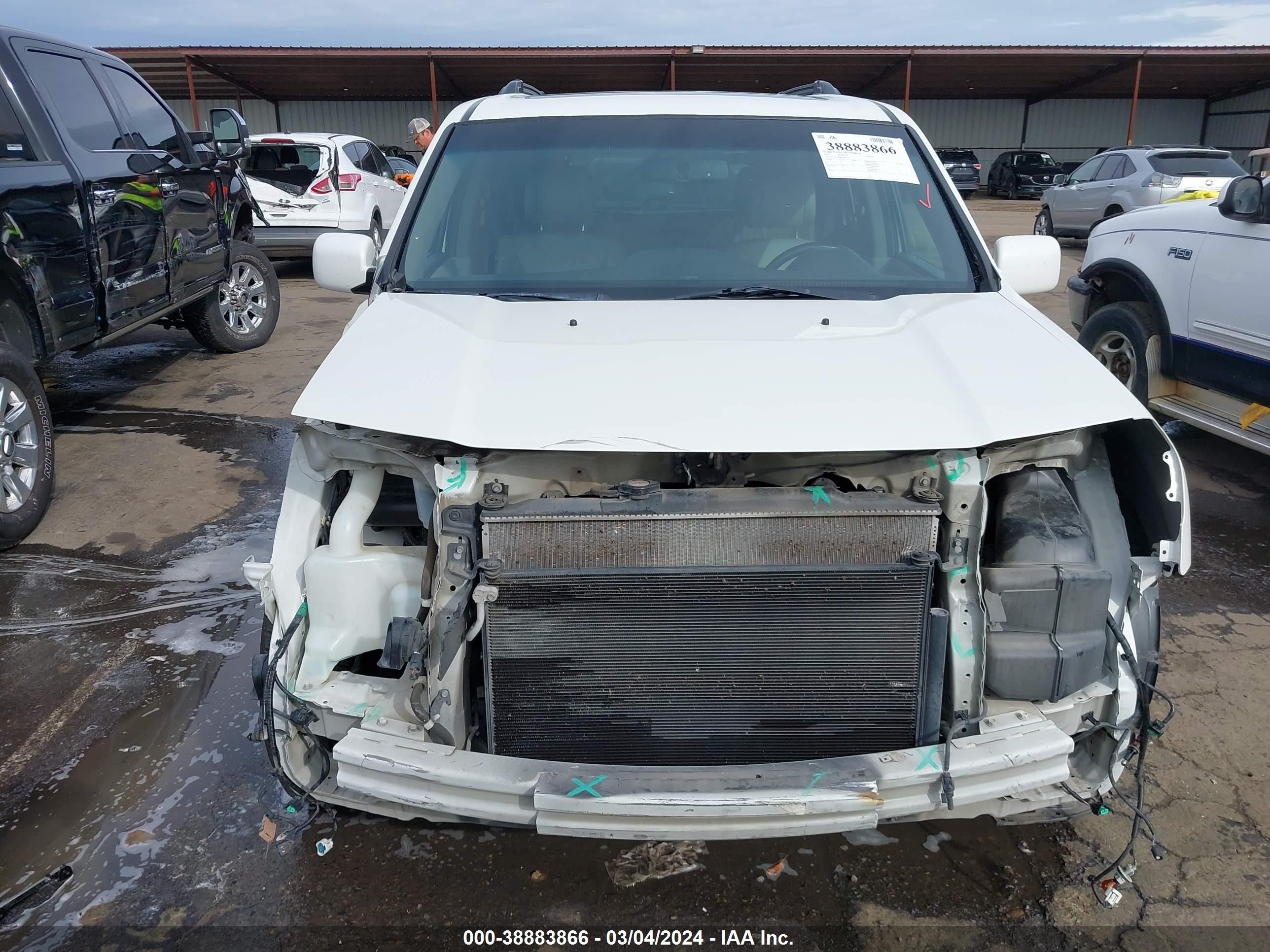 Photo 12 VIN: 5FNYF3H90FB002105 - HONDA PILOT 