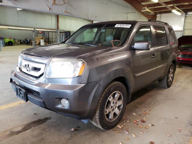 Photo 1 VIN: 5FNYF3H91BB027038 - HONDA PILOT TOUR 