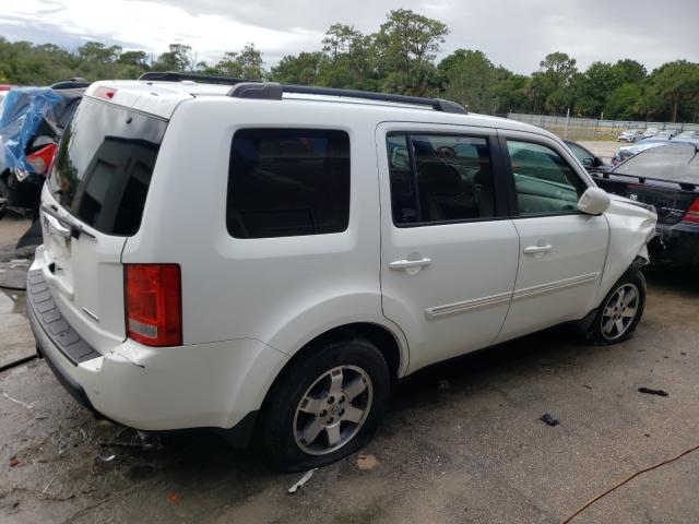 Photo 3 VIN: 5FNYF3H92AB008867 - HONDA PILOT TOUR 