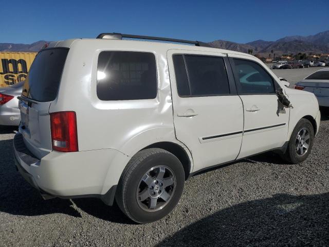 Photo 2 VIN: 5FNYF3H94BB014302 - HONDA PILOT TOUR 