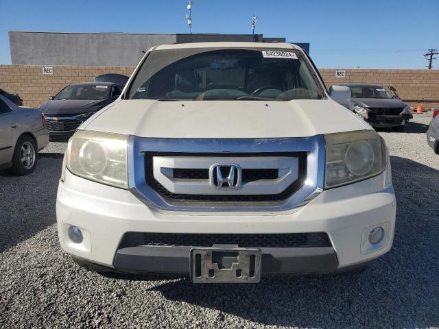 Photo 4 VIN: 5FNYF3H94BB014302 - HONDA PILOT TOUR 