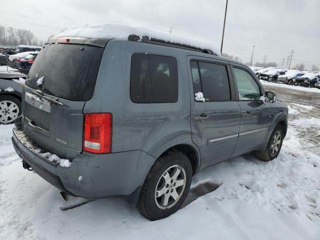 Photo 2 VIN: 5FNYF3H95AB004571 - HONDA PILOT TOUR 