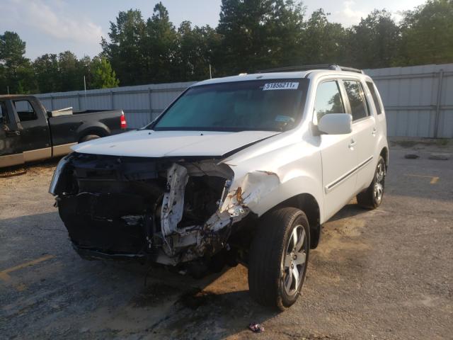 Photo 1 VIN: 5FNYF3H95CB035368 - HONDA PILOT TOUR 