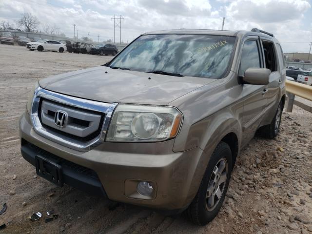 Photo 1 VIN: 5FNYF3H96BB038410 - HONDA PILOT TOUR 