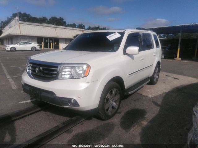 Photo 1 VIN: 5FNYF3H96FB022083 - HONDA PILOT TOUR 