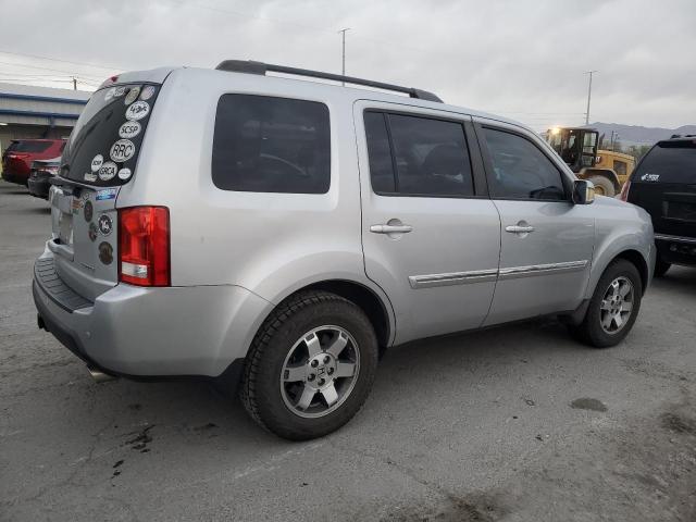 Photo 2 VIN: 5FNYF3H97AB001493 - HONDA PILOT TOUR 