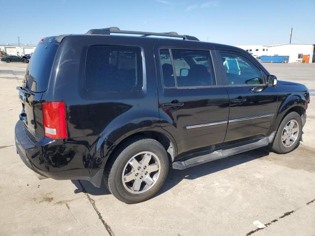 Photo 2 VIN: 5FNYF3H97BB013337 - HONDA PILOT TOUR 