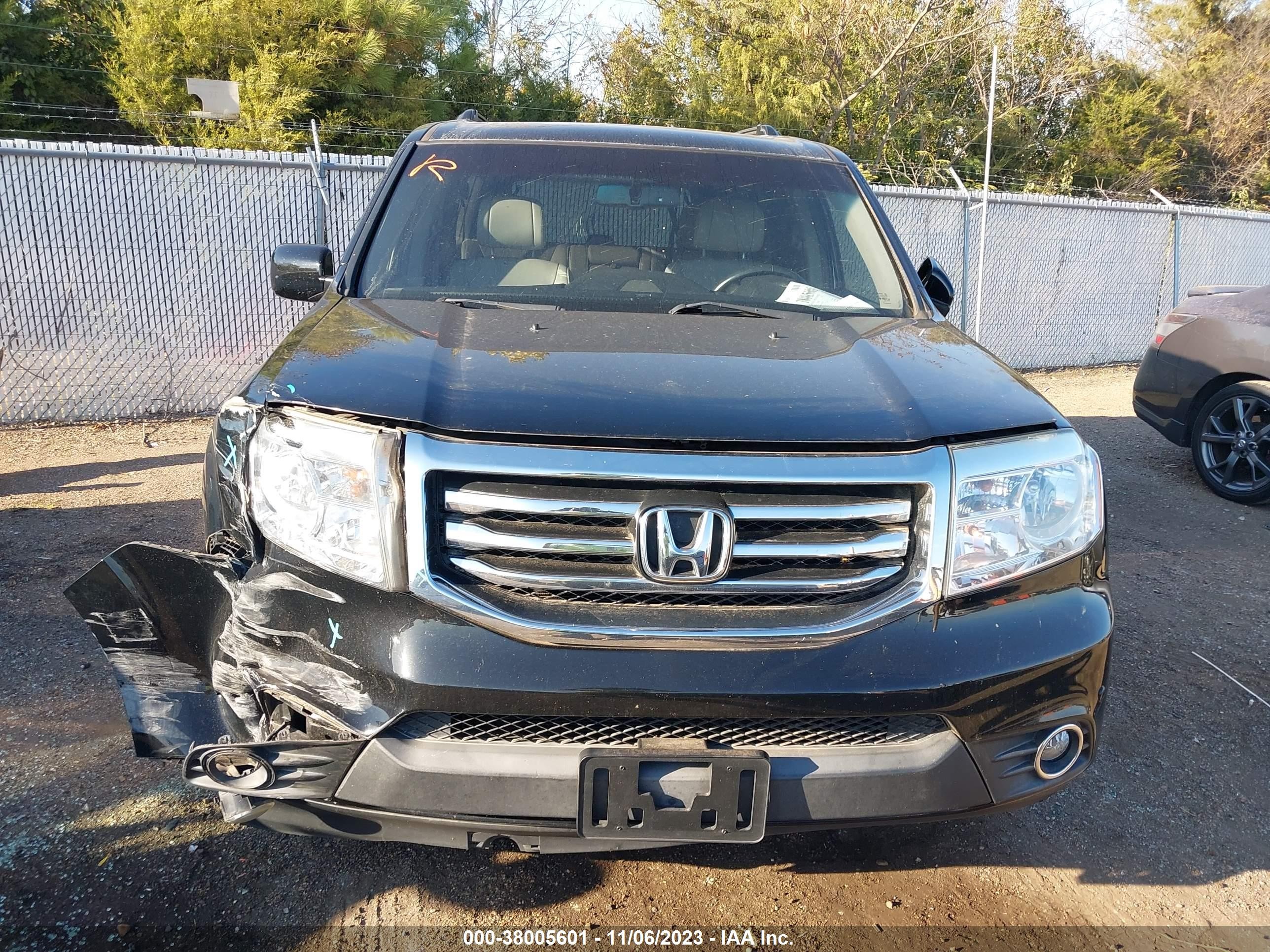 Photo 11 VIN: 5FNYF3H97CB035338 - HONDA PILOT 