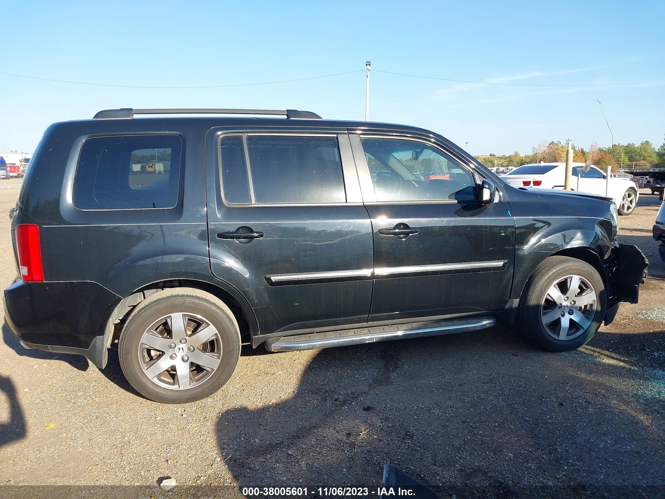 Photo 12 VIN: 5FNYF3H97CB035338 - HONDA PILOT 