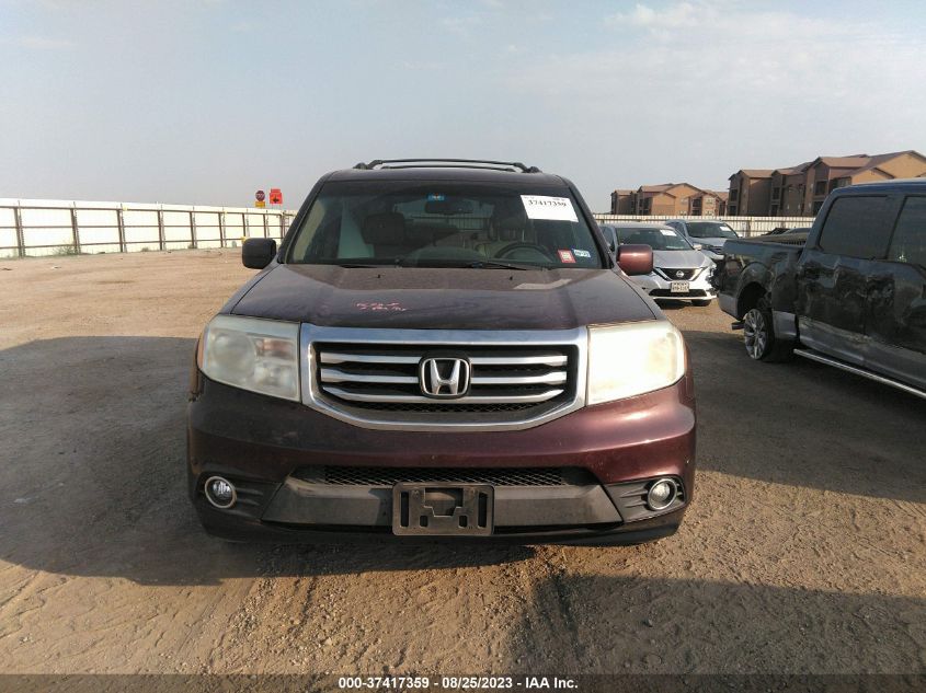 Photo 11 VIN: 5FNYF3H99CB037009 - HONDA PILOT 