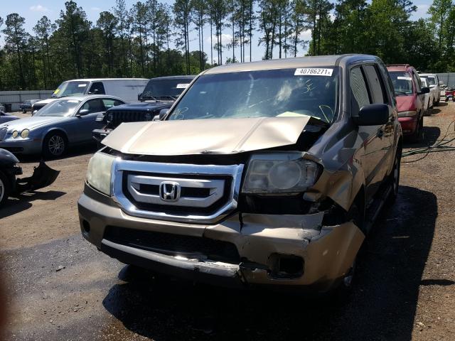 Photo 8 VIN: 5FNYF4H28BB027594 - HONDA PILOT LX 