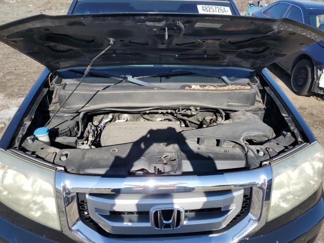 Photo 11 VIN: 5FNYF4H40BB098385 - HONDA PILOT 