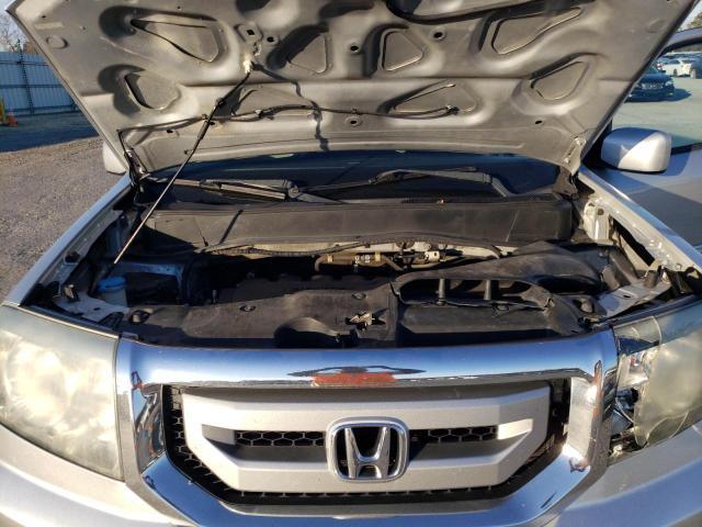 Photo 10 VIN: 5FNYF4H43BB074856 - HONDA PILOT 