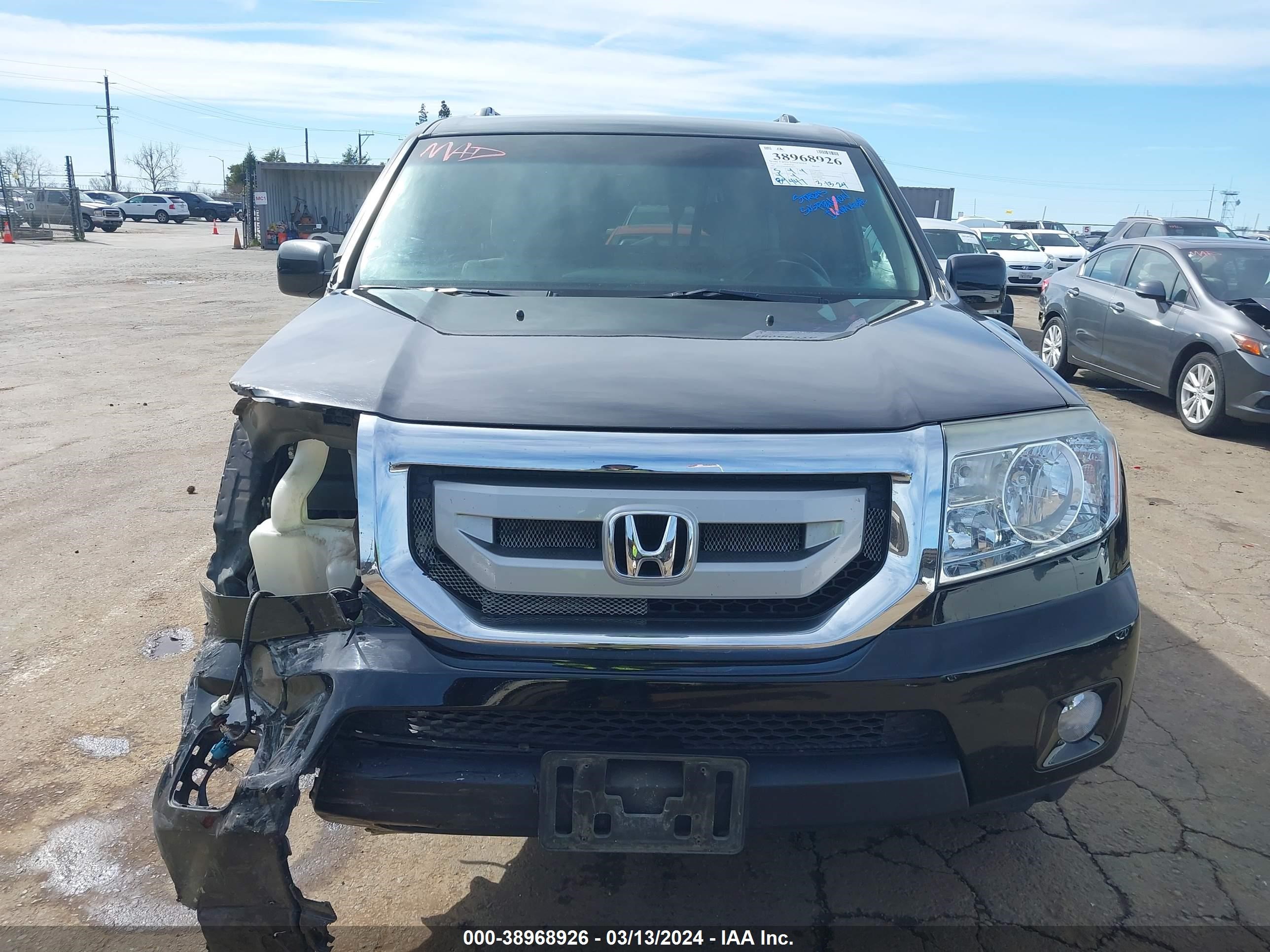 Photo 12 VIN: 5FNYF4H46BB024307 - HONDA PILOT 