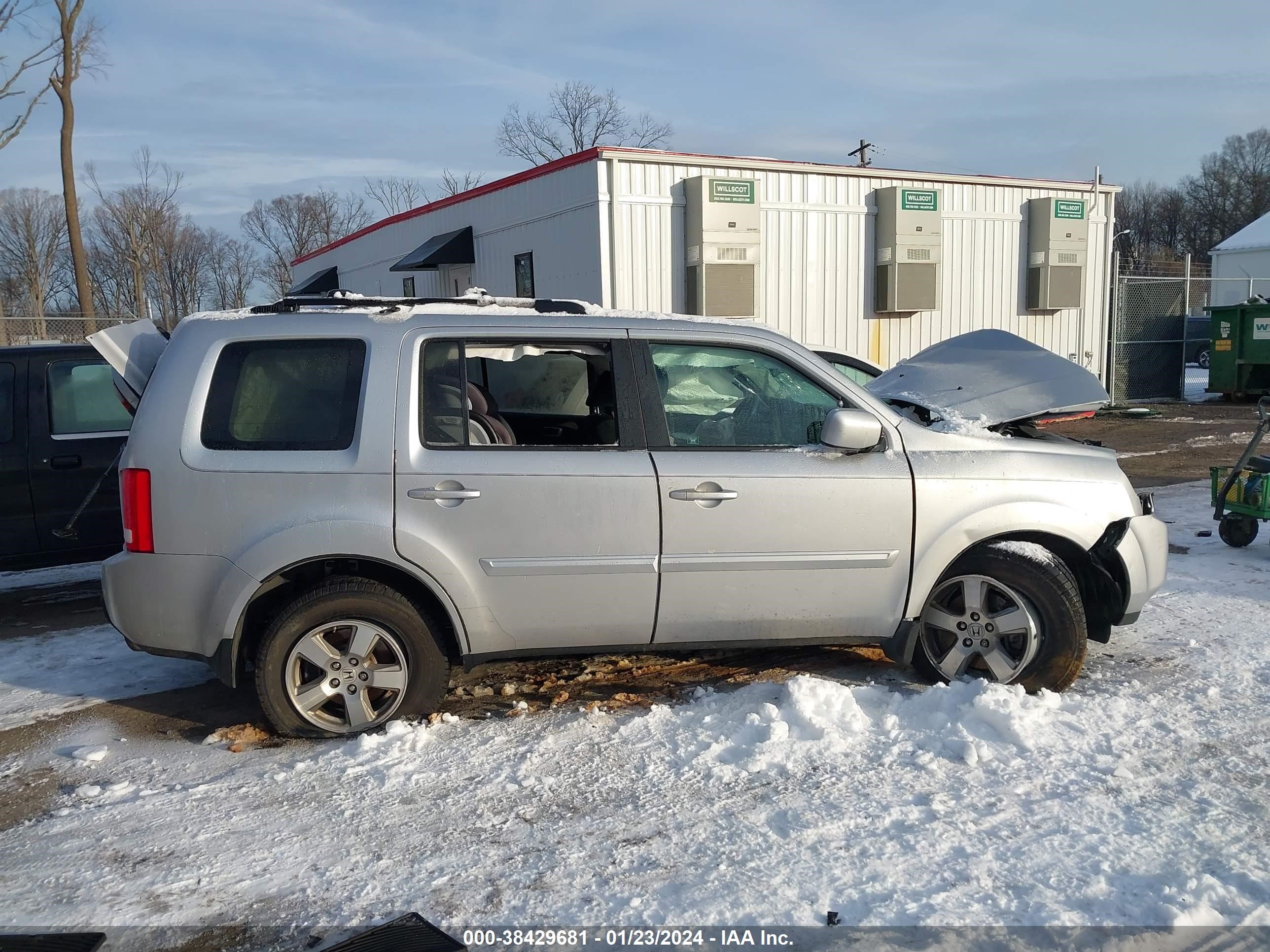 Photo 12 VIN: 5FNYF4H48BB089014 - HONDA PILOT 