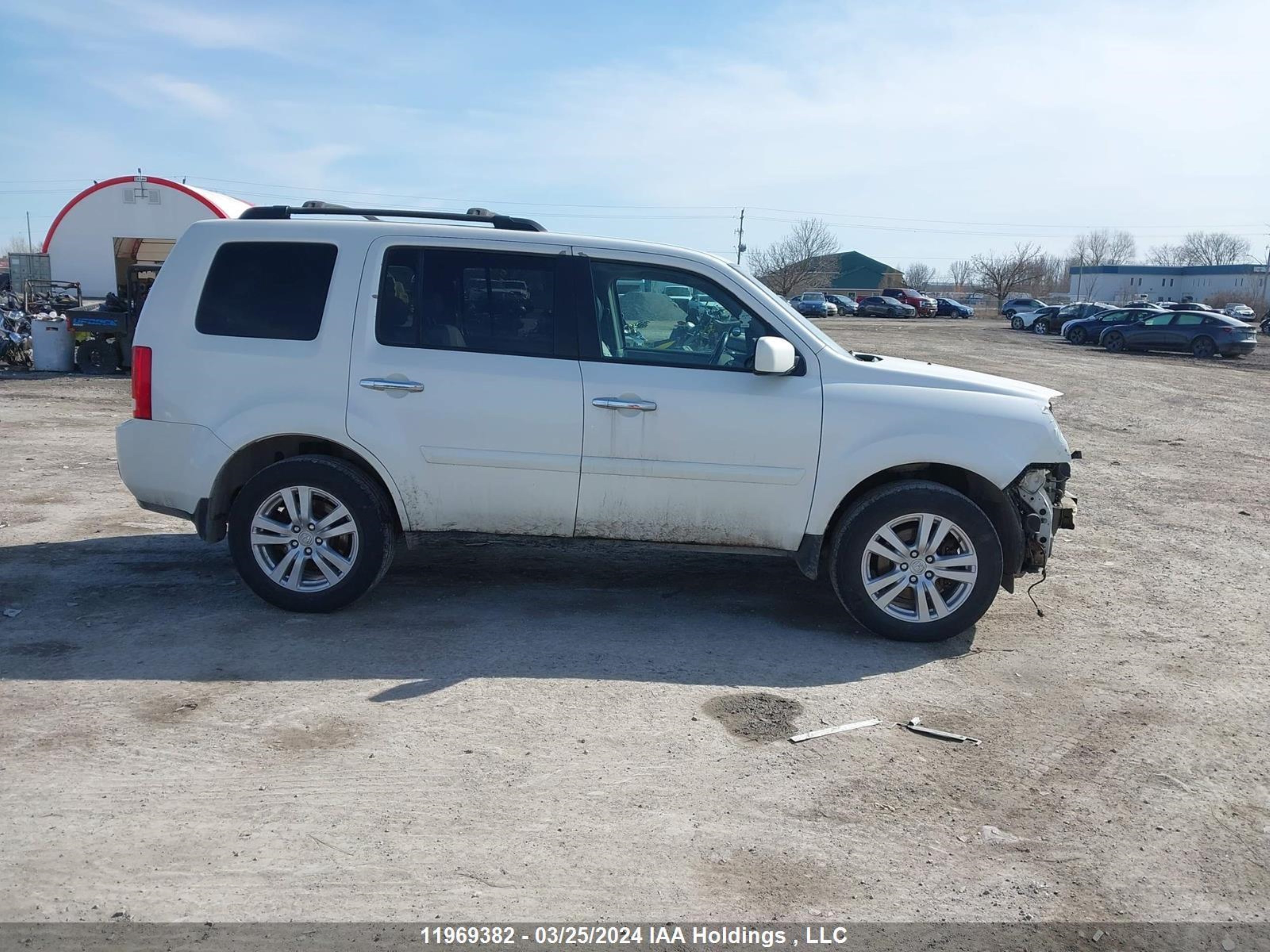 Photo 12 VIN: 5FNYF4H53BB502305 - HONDA PILOT 