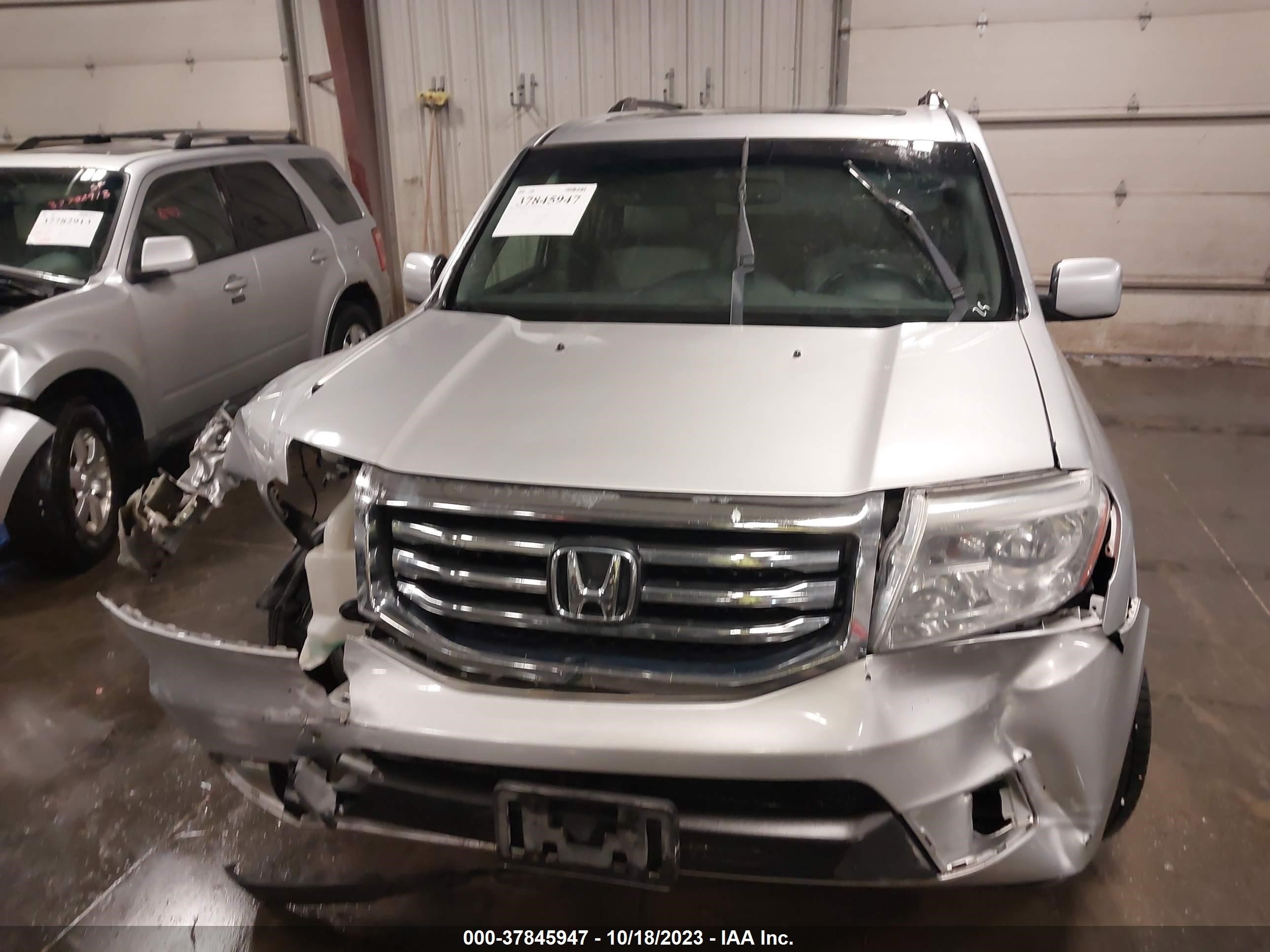 Photo 12 VIN: 5FNYF4H54CB065058 - HONDA PILOT 